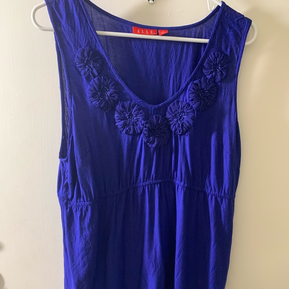 Elle blue sleeveless top with flower rosettes elastic waist. Read. See last pic.
